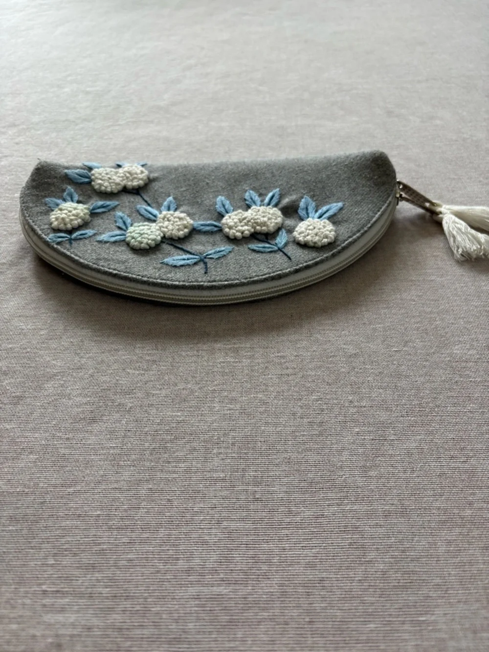 Grey embroidered floral half moon whimsical coquette clutch bag.